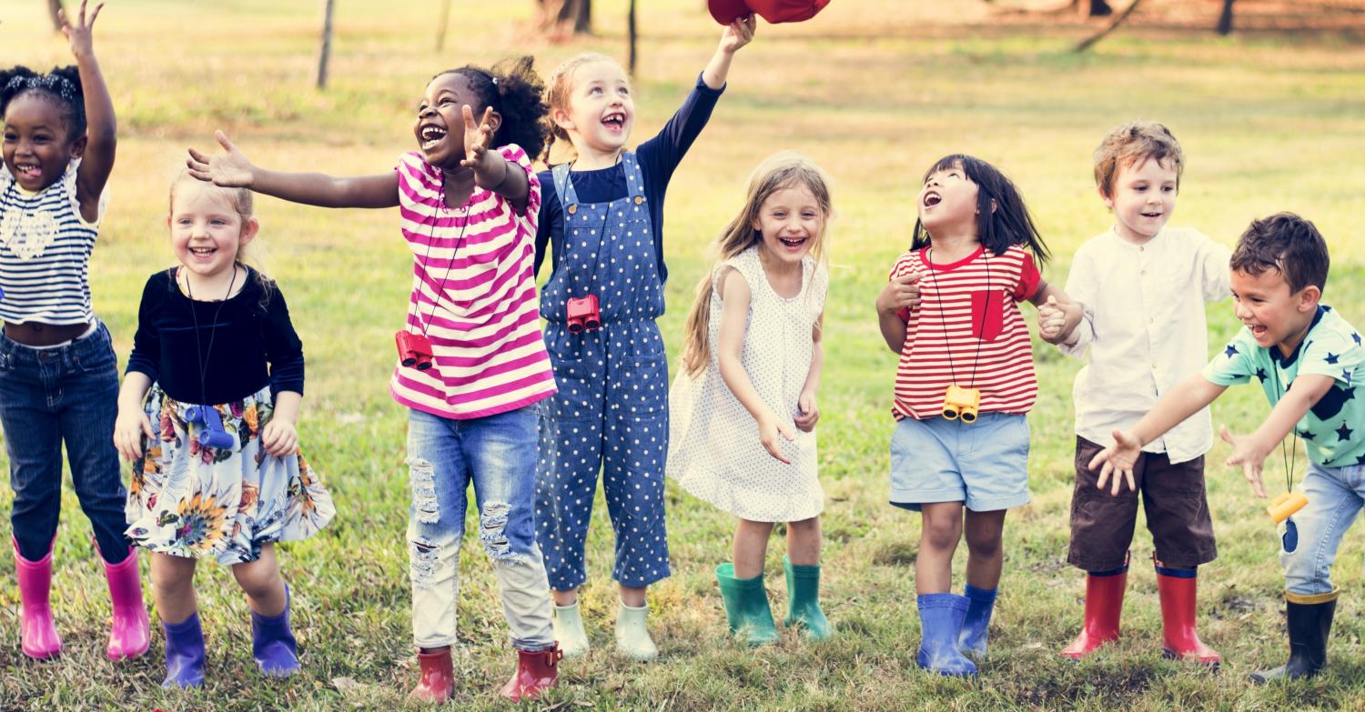 A group of children playing in a park