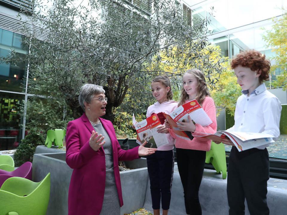 Minister Zappone with three children at the launch of the Key Findings
