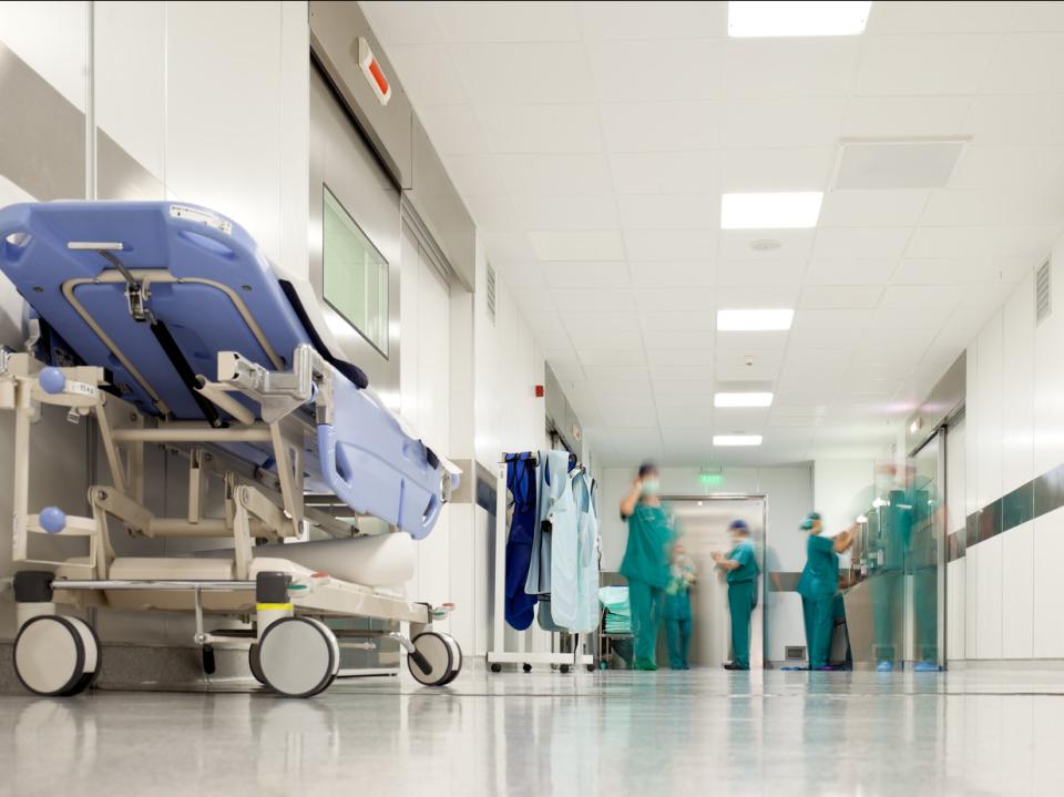 A near empty corridor in a hospital 