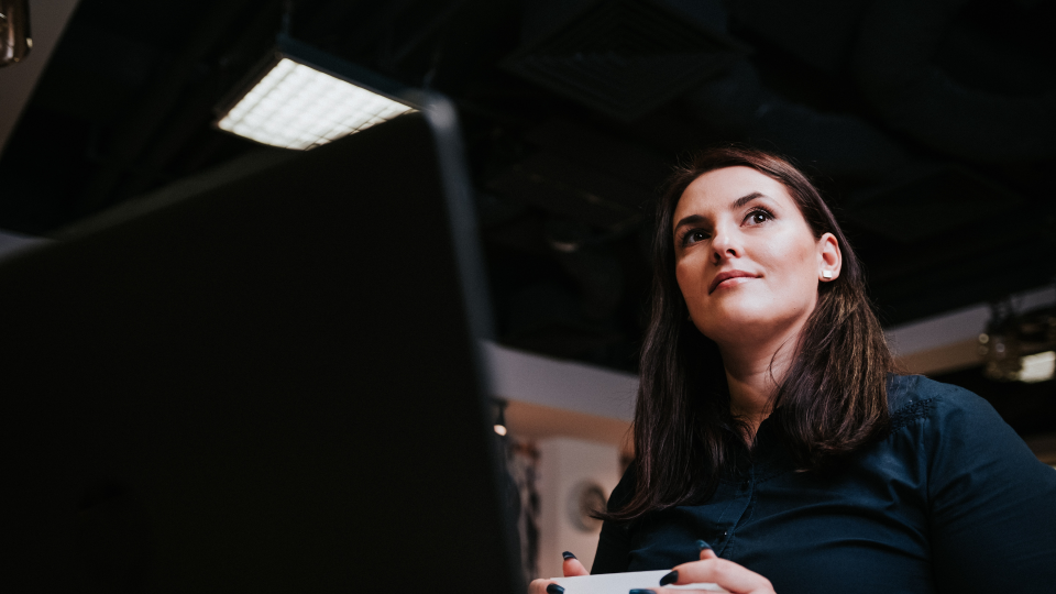 Woman sitting at desk in office