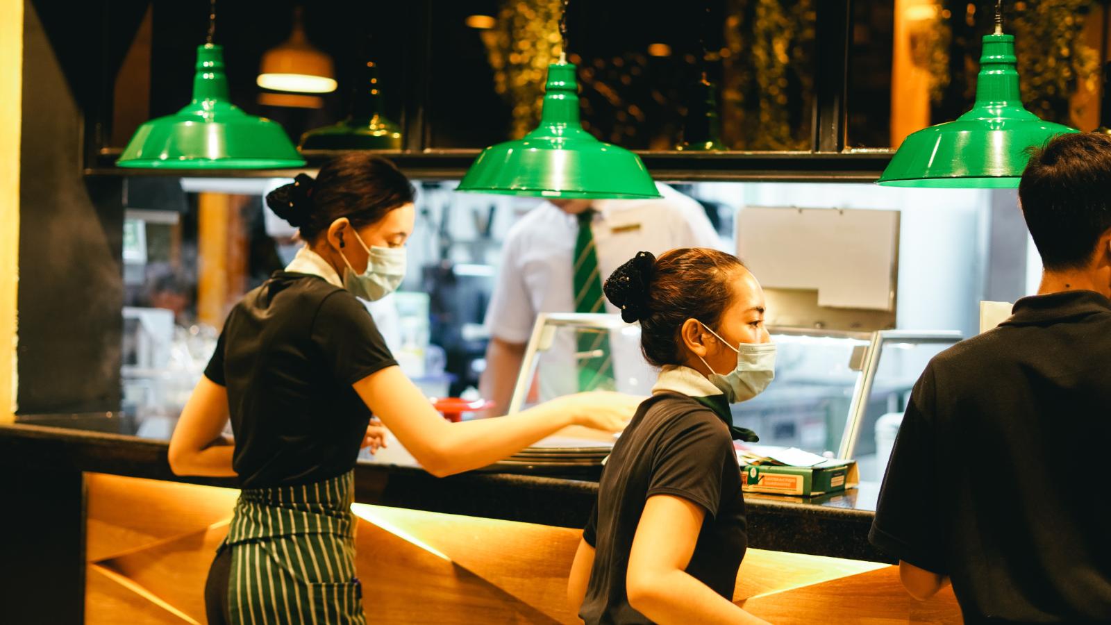 Workers in a busy restaurant
