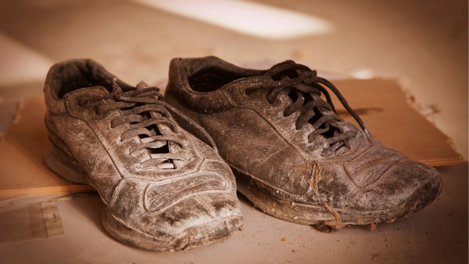 A pair of battered shoes 