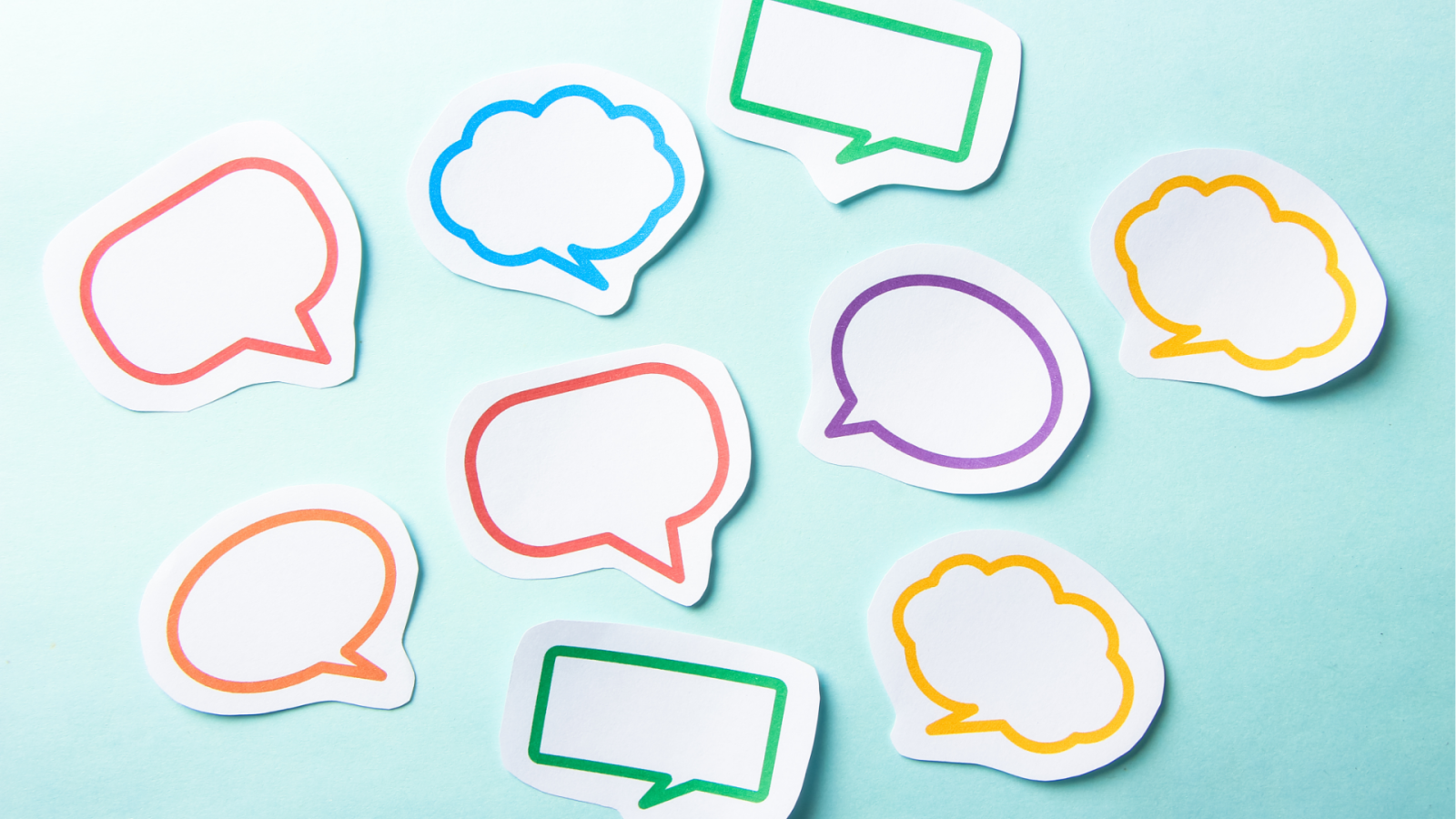 A collection of speech and thought bubble stickers in various shapes—rectangular, oval, and cloud-like—outlined in red, blue, green, purple, orange, and yellow, arranged on a light blue background