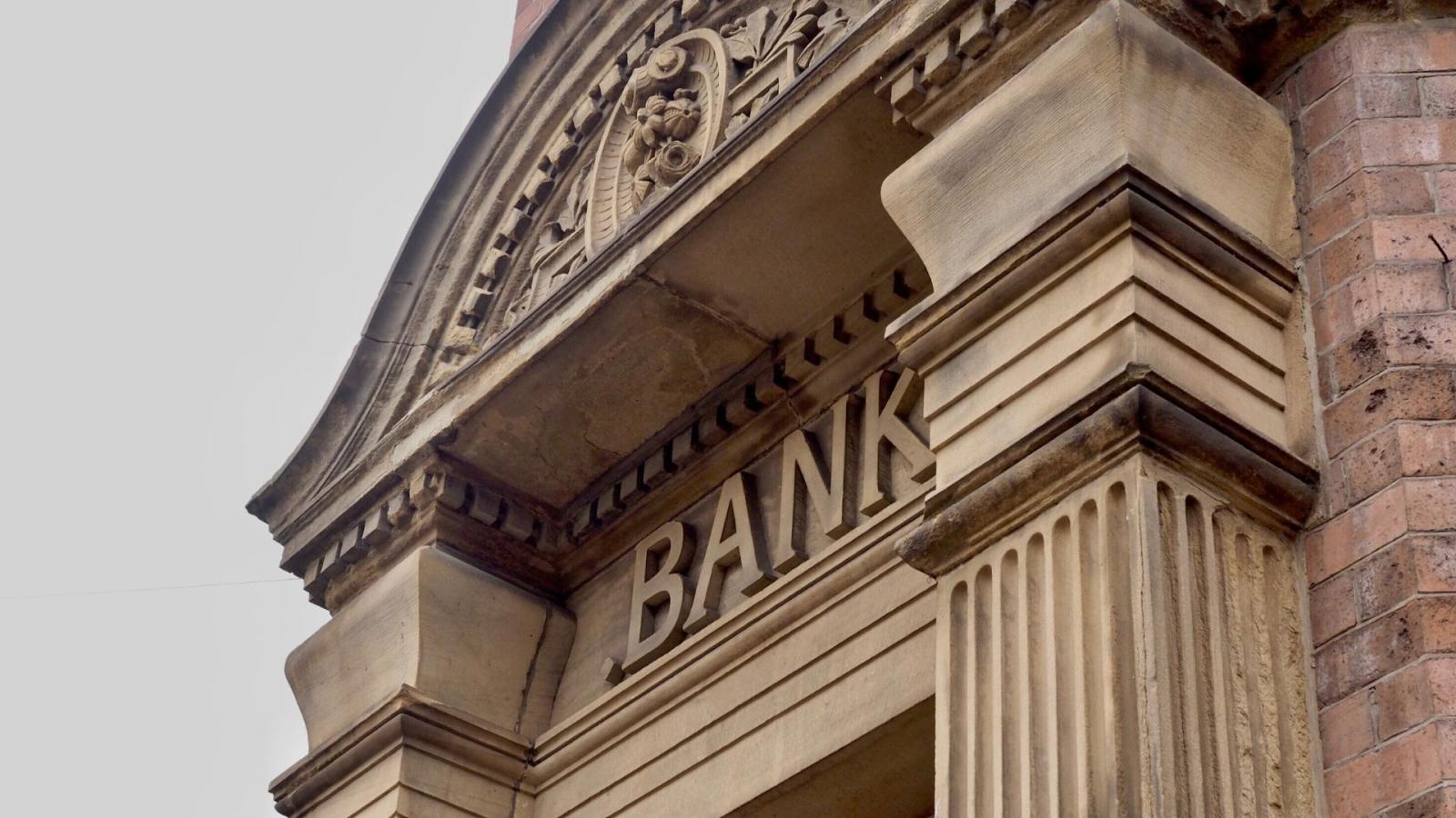 Close up of a sign of a bank from the outside